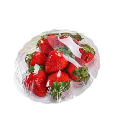 PVDC PVC PE imballaggio Rollo di avvolgimento in plastica trasparente PE Protective Food Cling Film con tagliatore scorrevole